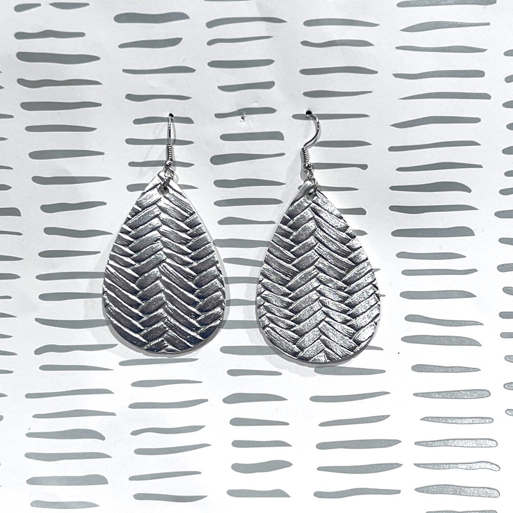 Faux leather pierced dangling earrings